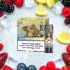 RandM Tornado Pods Blue Razz Lemonade mit auffälliger Gorilla-Verpackung und Pod auf eisigem Hintergrund mit Beeren und Zitronenscheiben – sommerlich-frisches Design mit Nikotinwarnung.